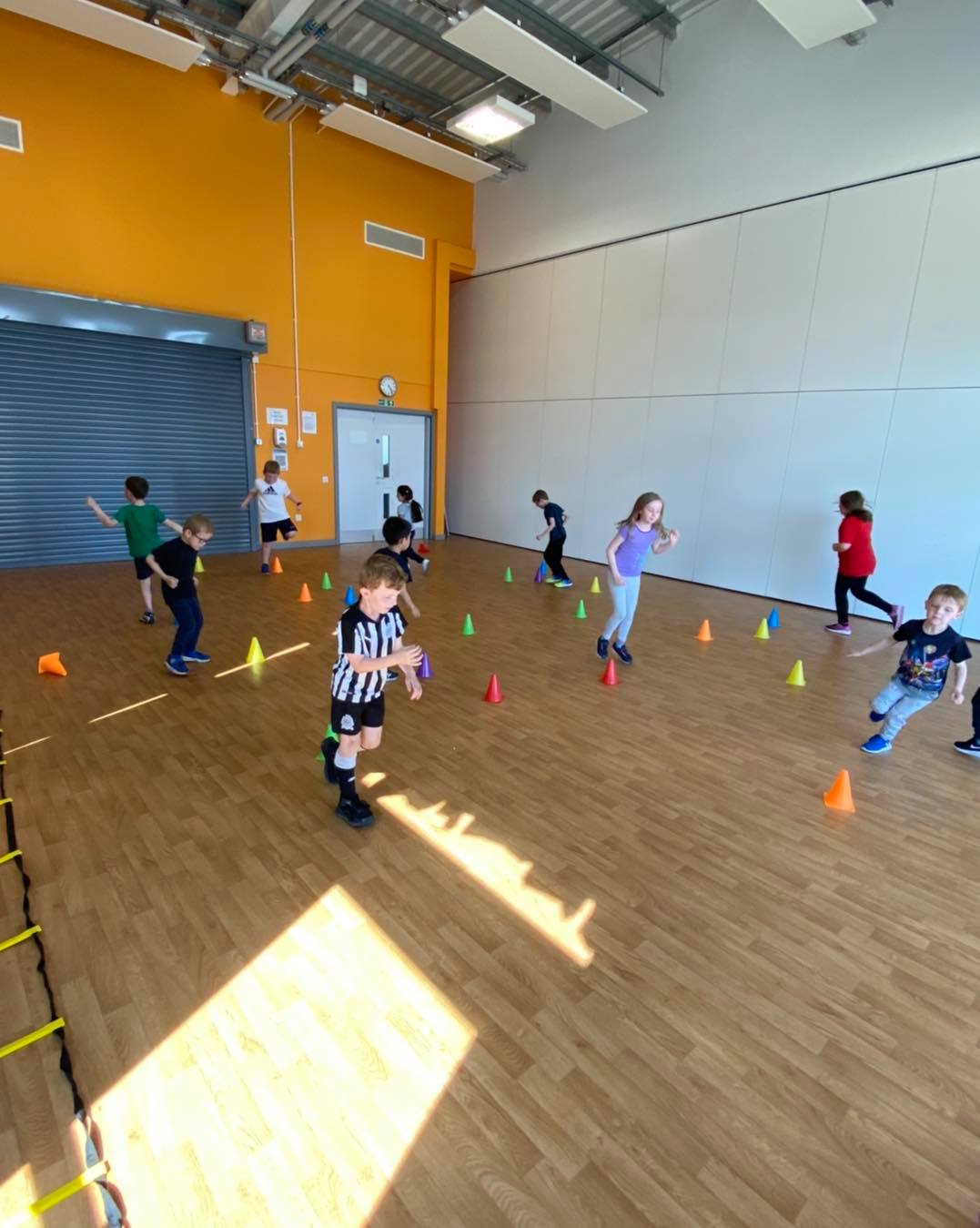 Children taking part in a PE Monkeys PE lesson