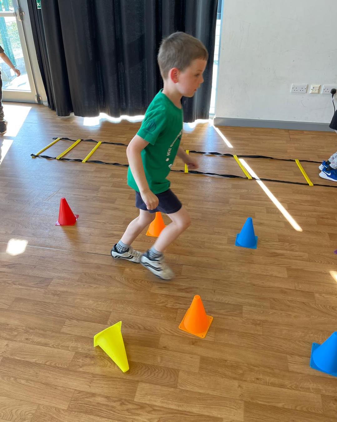 PE Monkeys coach leading an activity